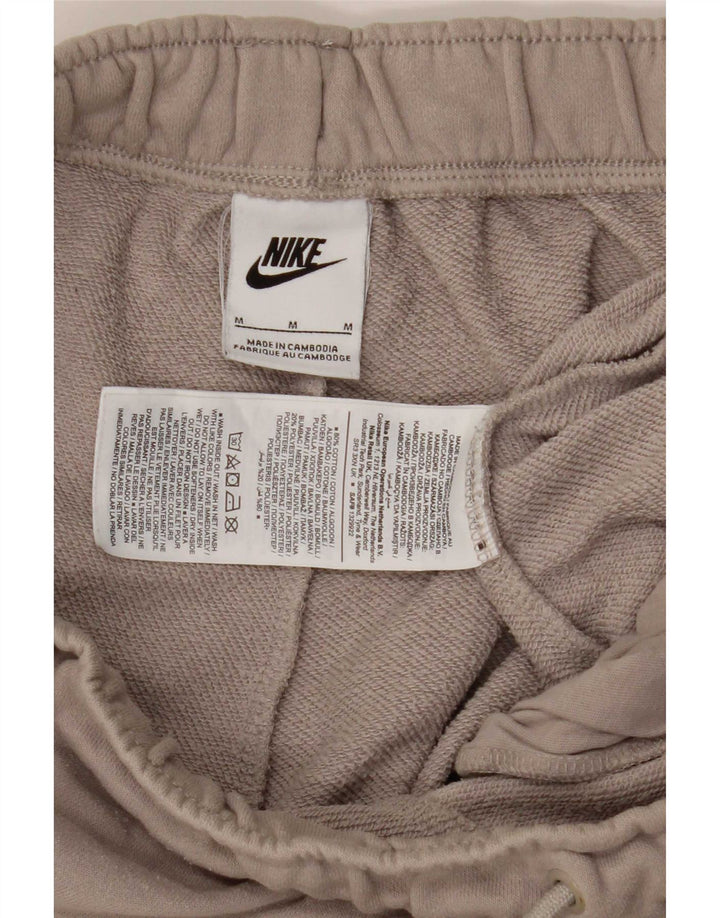 Pantalon de survêtement graphique Nike Homme Pantalon de jogging Beige moyen colour block