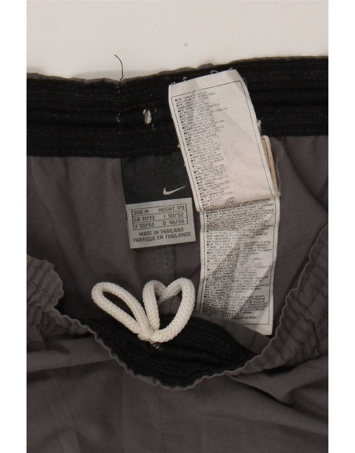 Short de sport Nike pour homme en polyester color block gris moyen