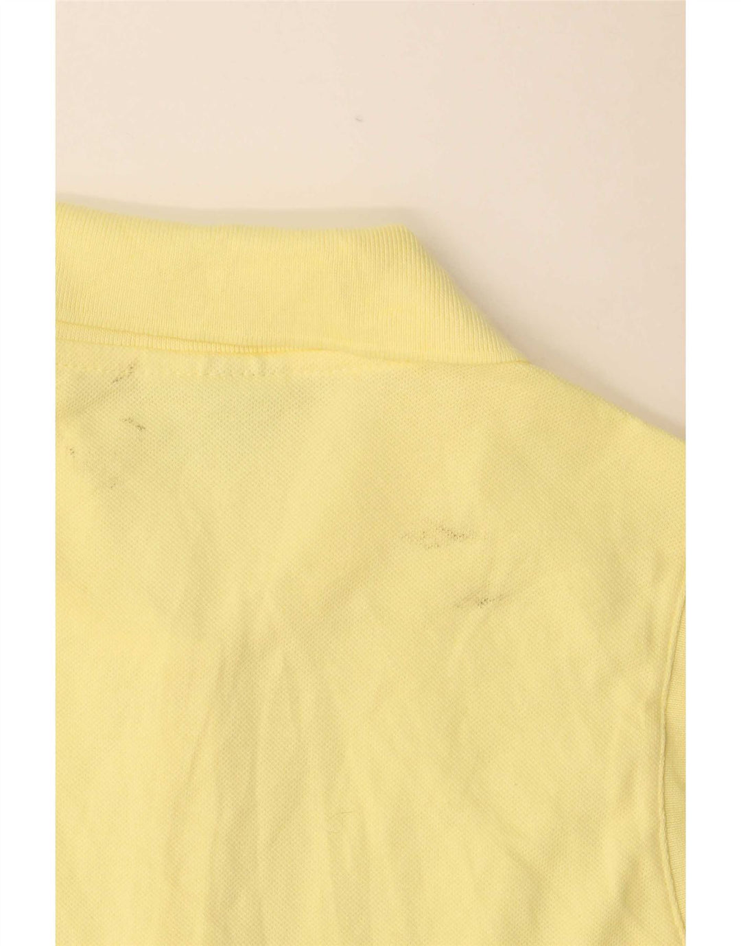 Lacoste Polo sans manches femme taille 40 coton jaune moyen