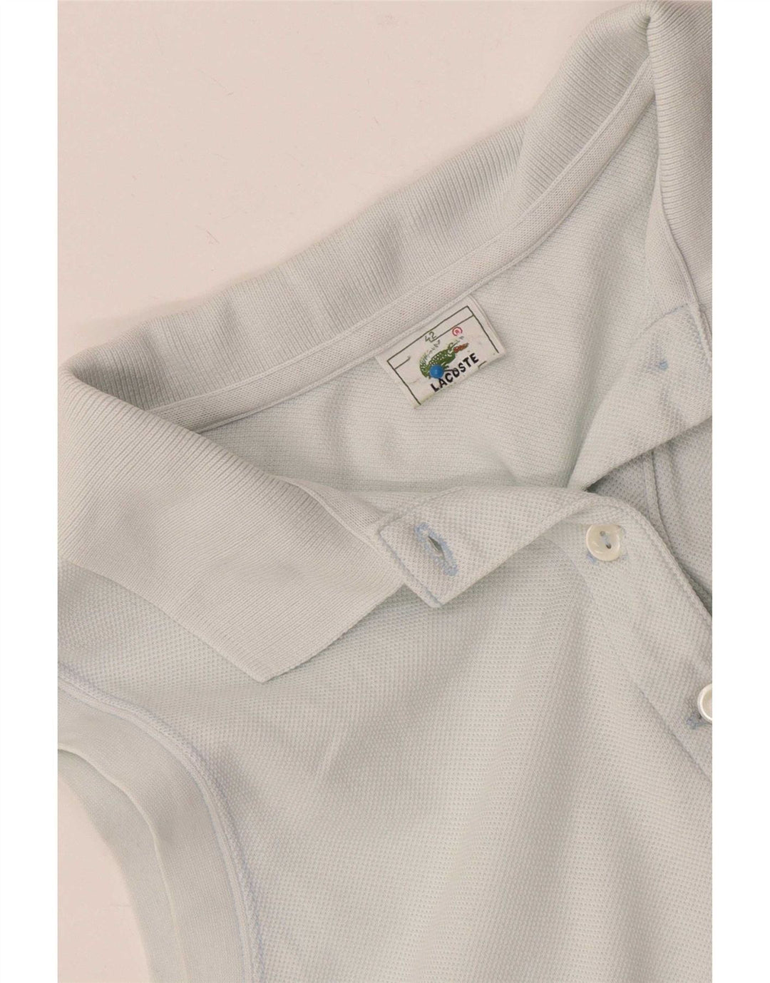 Lacoste Polo sans manches pour femme Taille 42 Grand Bleu
