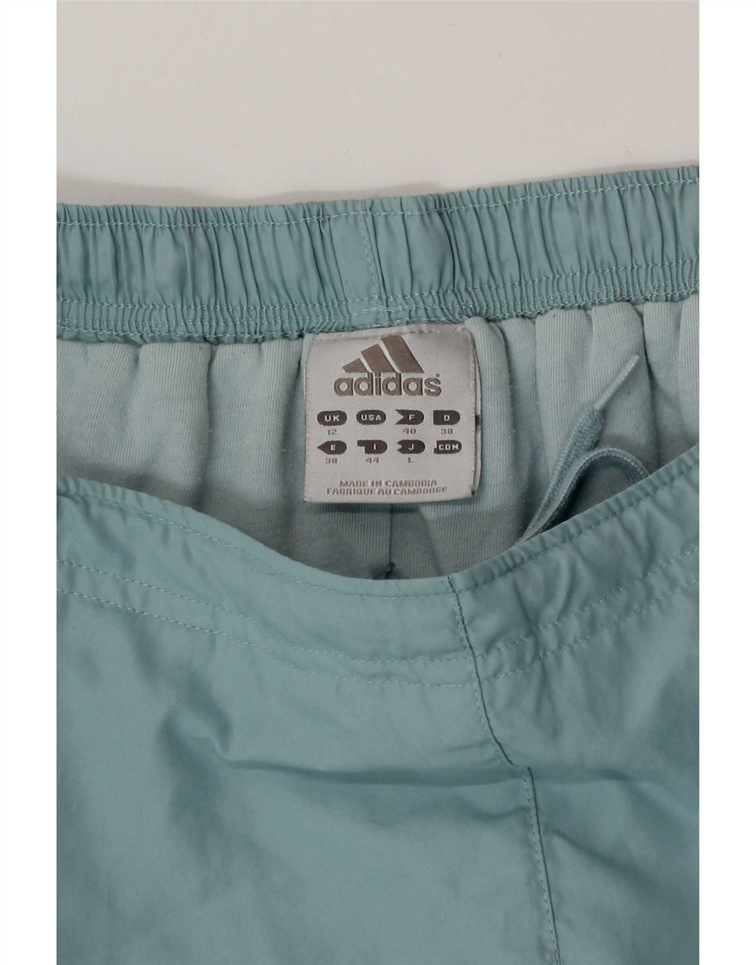 Adidas Pantalon coupe-vent pour femme UK 12 Bleu moyen Polyester