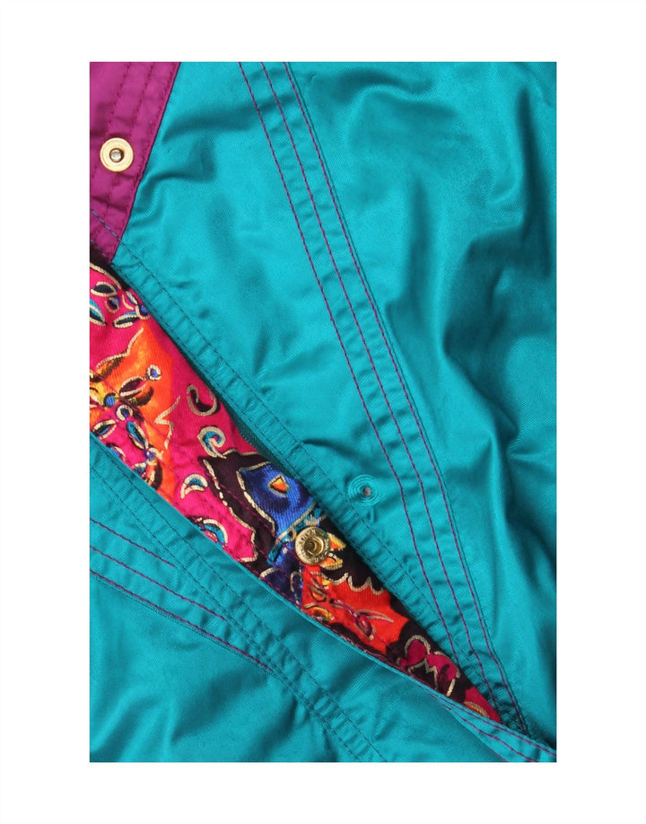 NEVICA Veste coupe-vent surdimensionnée pour femme US 8 Turquoise moyen