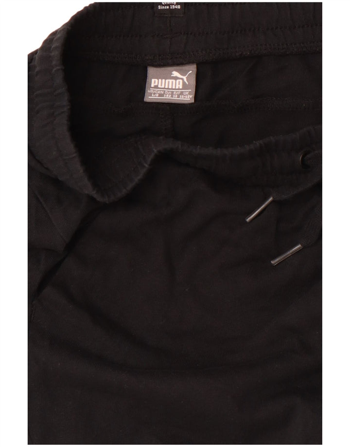 PUMA Short de sport graphique garçon 11-12 ans noir