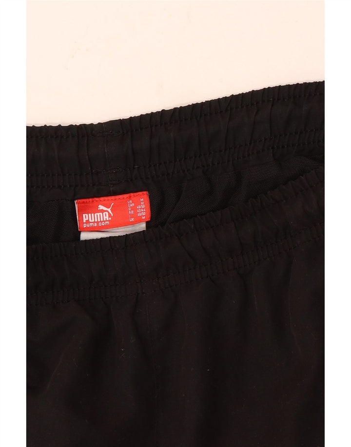 Puma Short de Sport Graphic Bermuda Homme Noir Moyen