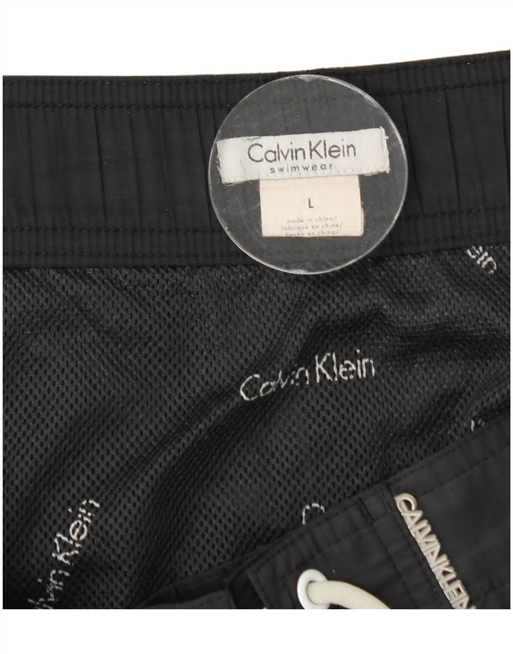 Calvin Klein Short de bain graphique pour hommes, grand, en polyester color block noir