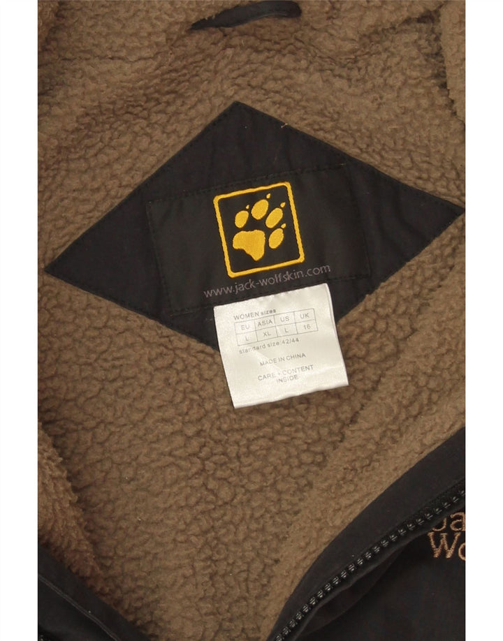 Jack Wolfskin Veste coupe-vent Sherpa pour femme UK 16 Large Noir Polyester