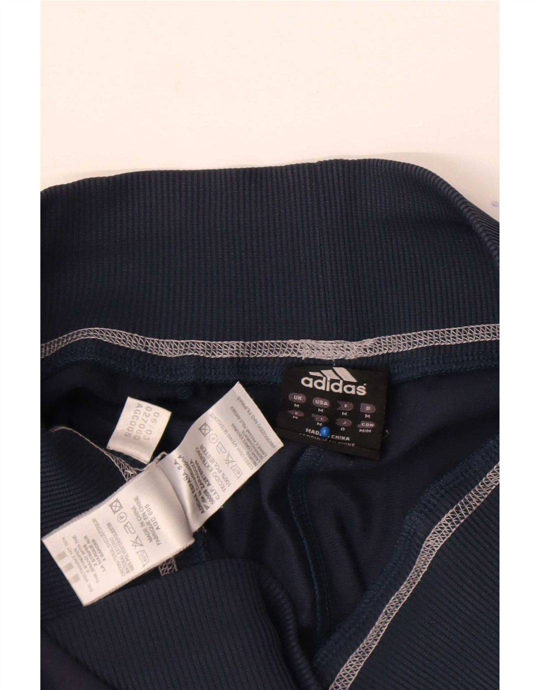 Adidas Pantalon de survêtement graphique pour homme Bleu marine moyen Polyester