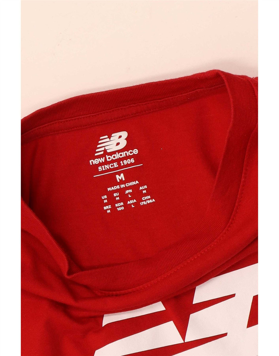 New Balance T-Shirt Graphique Homme Rouge Moyen