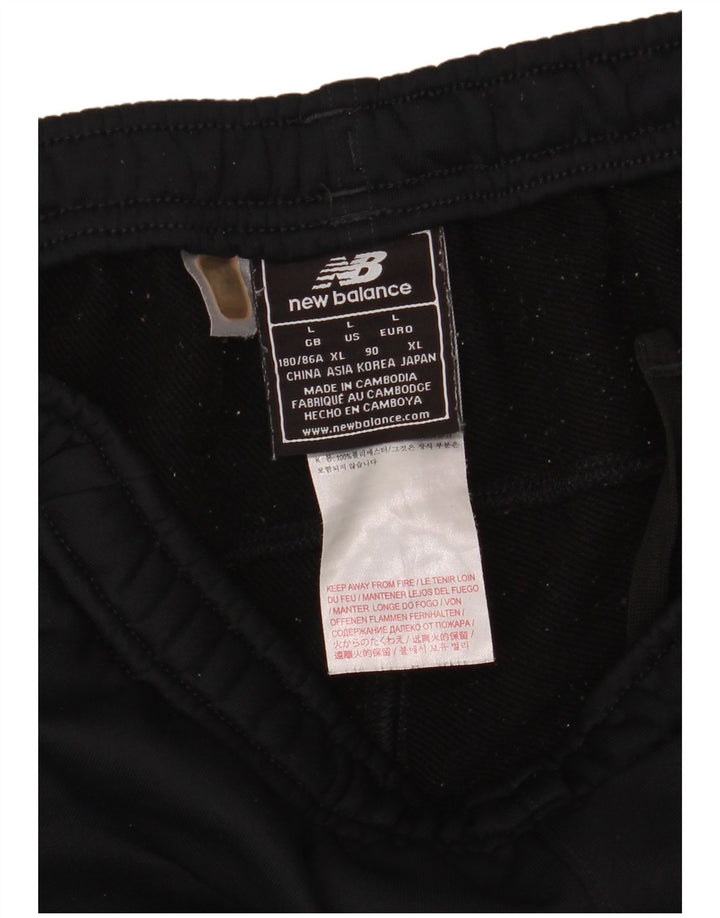 New Balance Pantalon de survêtement pour homme Large Noir Polyester